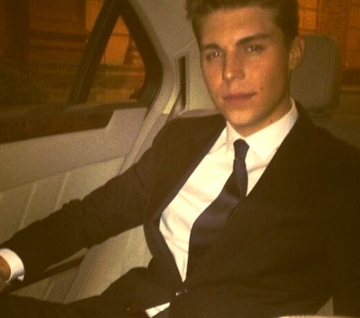 Wearing Versace in the back of a limo